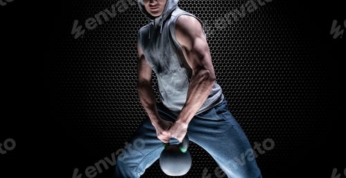 Preview: Portrait Of An Athlete Crouching With A Kettlebell. The Concept Of Sport And Healthy Lifestyle