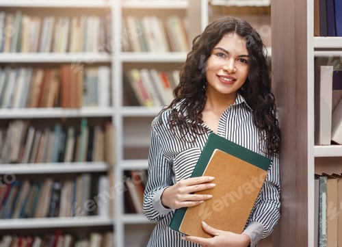 Preview: Smiling latina woman holding textbooks at library