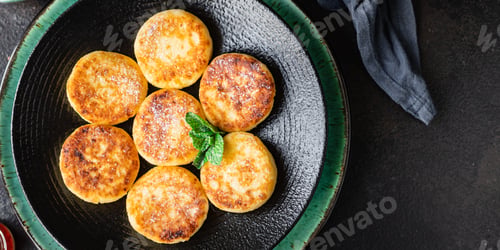Preview: Cheesecakes Breakfast Or Dessert Syrniki Curd Cottage Cheese Pancakes Healthy Meal Top View Copy