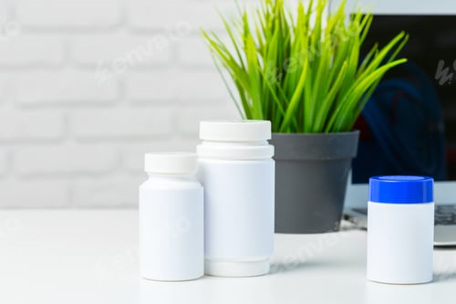 Preview: pills on the white table. close up.