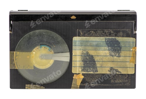 Preview: Closeup of a vintage video cassette isolated on a white background
