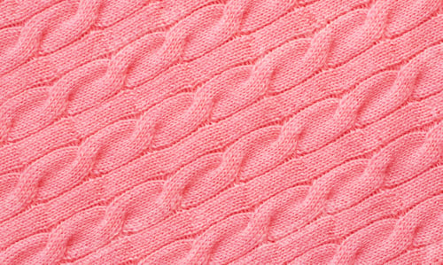 Preview: background of knitted braids in color 2023 viva magenta