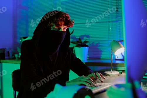 Preview: Curly Haired Man Hacking Computer