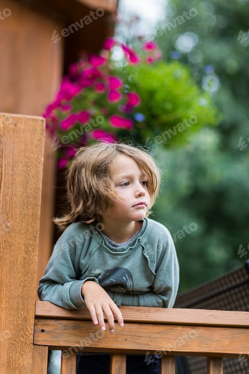 Preview: portrait of 5 year old boy looking away from camera