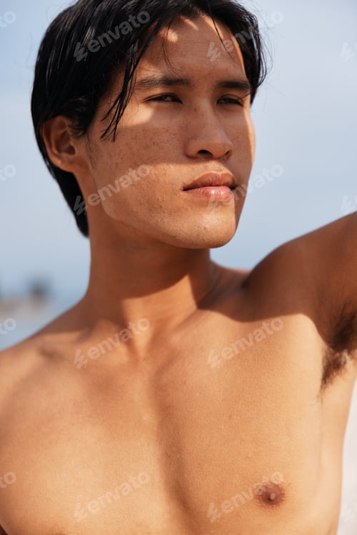 Preview: Active Asian Athlete Enjoying Beach Cardio Run at Sunset