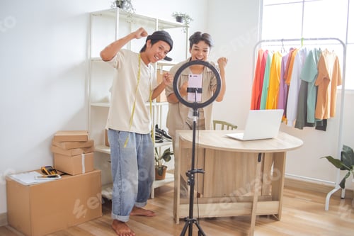 Preview: Young Entrepreneurs Celebrating Business Success With Live Stream