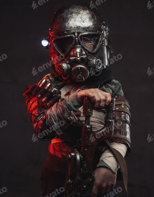 Preview: Apocalyptic child with riffle and gas mask stays in dark background