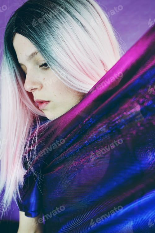 Preview: Cool portrait of young woman with pink colored hair