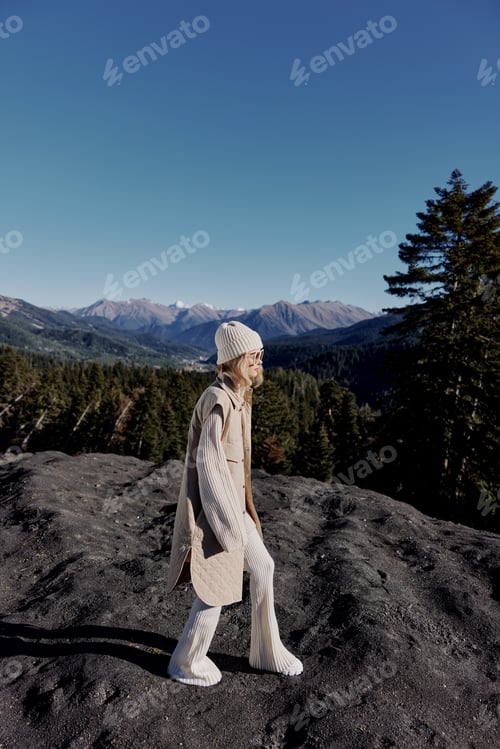 Preview: tourist standing on the top of the mountain forest relaxation