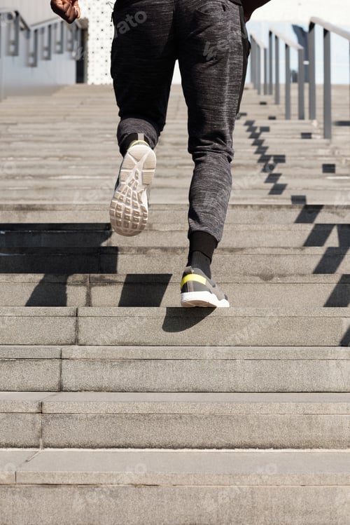 Preview: Man Running up Stairs Closeup