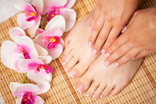 Preview: The picture of female legs and hands after pedicure and manicure