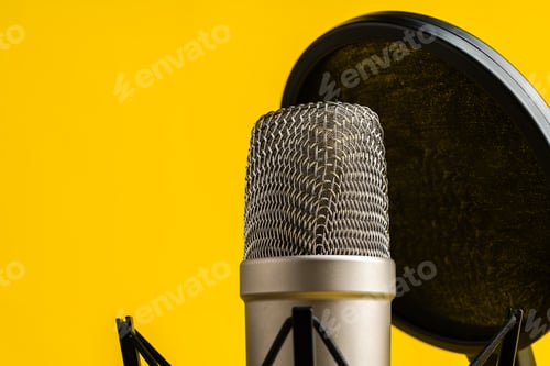 Preview: Professional microphone stand over yellow studio background