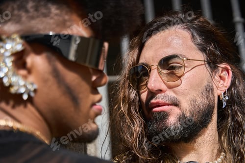 Preview: Gay couple sharing an intimate moment outdoors