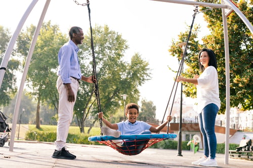 Preview: Beautiful happy african american family bonding at the park
