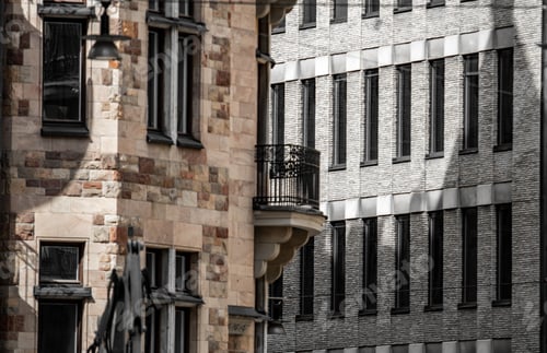 Preview: Closeup shot of high brick buildings in the city