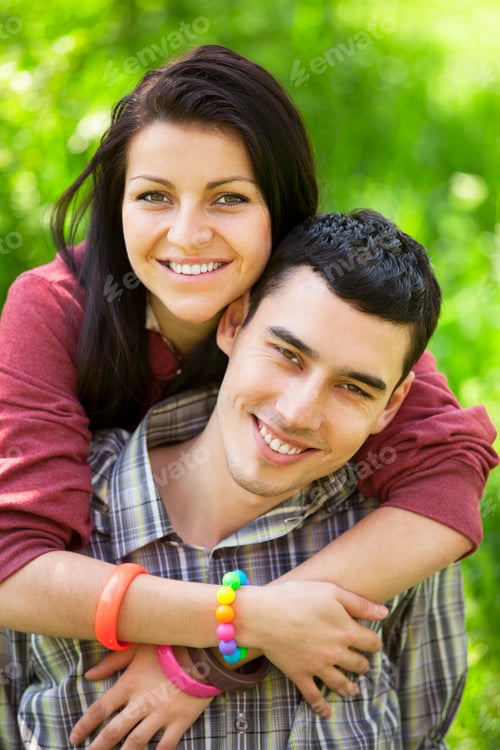 Preview: Couple Relaxing on Green grass