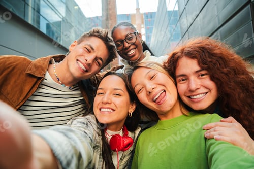 Preview: Group of diverse young friends smiling and taking a selfie together, showcasing joy and happiness