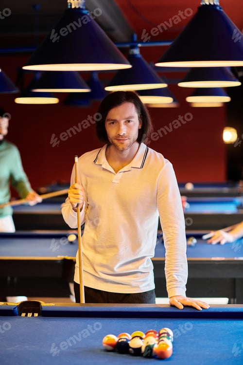 Preview: A Focused Moment On The Billiard Table