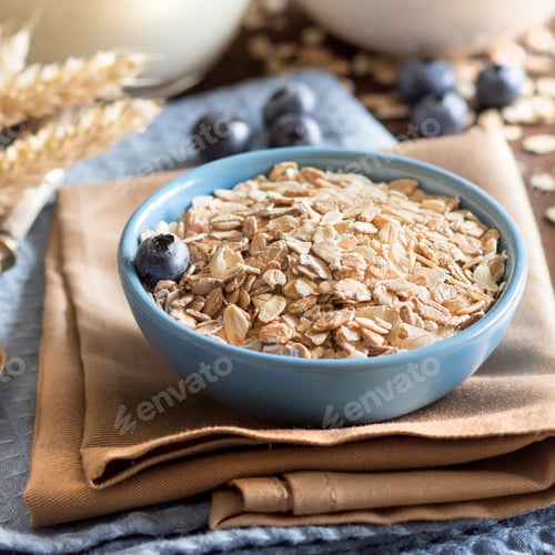 Preview: Rolled oats in a bowl with blueberries and milk