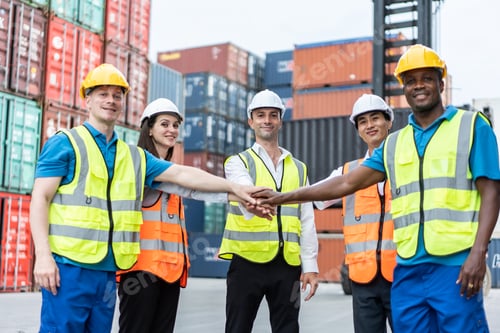 Preview: Group of young male and female worker working in container terminal.