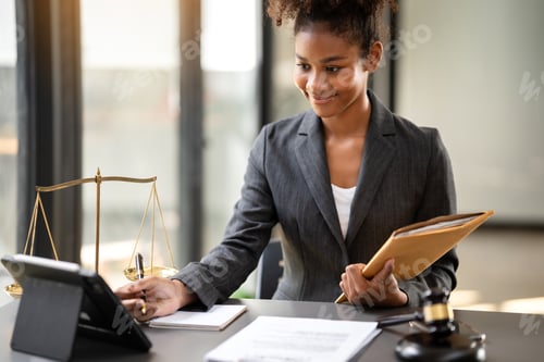 Preview: African american lawyer woman in suit holding envelope of busine