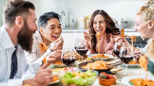 Preview: Food and beverage concept with guys and girls dining together Italian food
