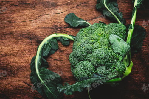 Preview: Fresh organic broccoli cabbage on old rustic wooden kitchen table background,