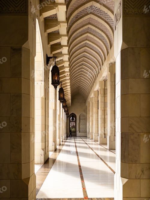 Preview: A stunning corridor with intricate arches, a beautiful tiled floor, and a wooden ceiling.