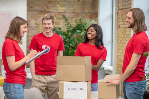 Preview: A group of young volunteers at work in a distribution point