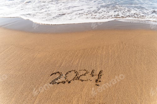 Visualização: 2024 escrito à mão na areia em uma bela praia