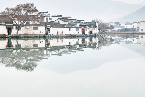 Preview: Mirror image of traditional houses by lake, Hongcun Village, Anhui Province, China