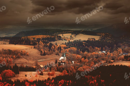Preview: church in forest in autumn season time in South Poland,