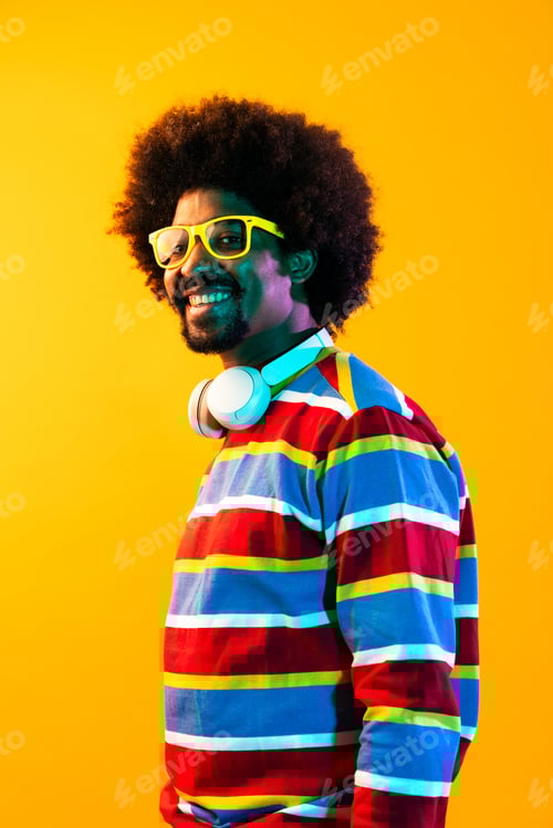 Preview: African man portrait in studio on colorful background