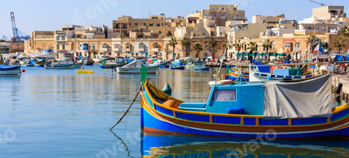 Preview: Marsaxlokk fishermen village in Malta. Traditional colorful boats at the port of Marsaxlokk
