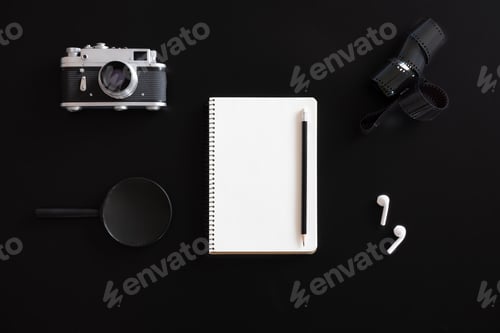 Preview: Retro composition with blank notepad on black, flat lay, minimalism.