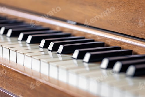 Preview: Close-up, keys of an antique wooden piano.