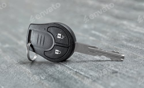 Preview: New modern car key on grey background