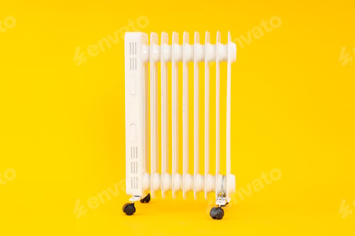 Preview: Modern white electric heater on yellow background