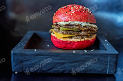 Preview: Homemade hamburger with red bun