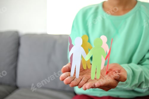 Preview: Paper Cut Human Figures With Different Colors Making Circle On Hands