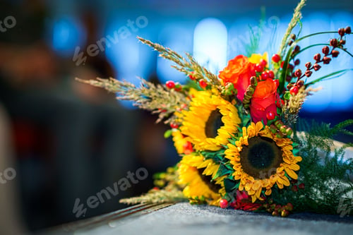Preview: Vibrant bouquet of multicolored flowers arranged on a table