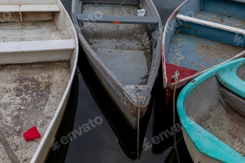 Preview: Closeup shot of the front of wooden boats in the dock