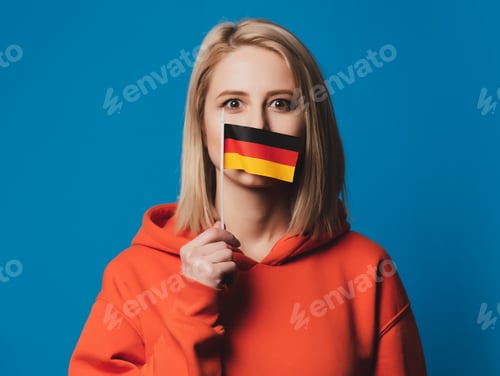 Preview: beatiful girl holds flag of Germany