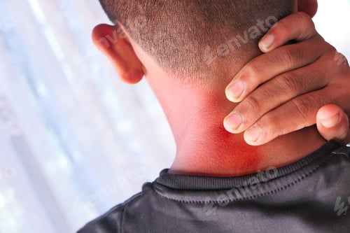 Preview: man suffering from neck or shoulder pain at home.