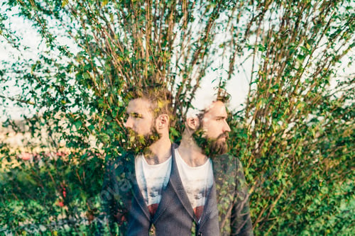 Preview: Double exposure young handsome bearded man