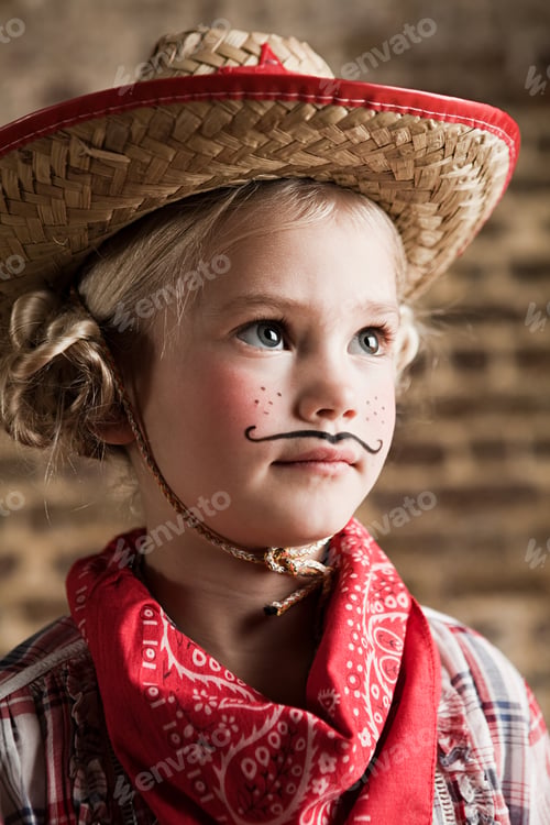 Preview: Young girl dressed up as cowgirl