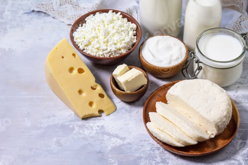Preview: Various fresh dairy products, milk, sour cream, cottage cheese, yogurt and butter.