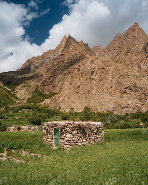 Preview: Stone hut nestled in lush hushe valley landscape