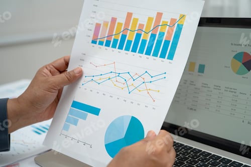 Preview: Asian business woman working with financial graph.