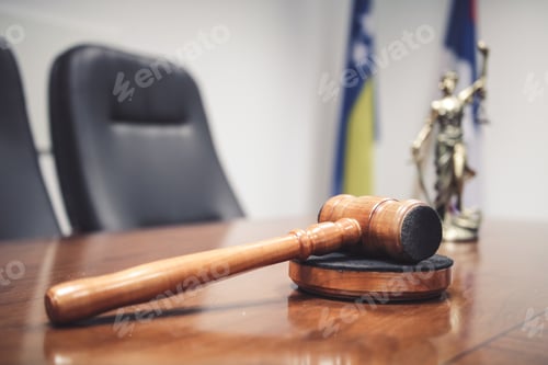 Preview: Shot of a wooden gavel in the court room